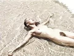 Behårede fisser på stranden